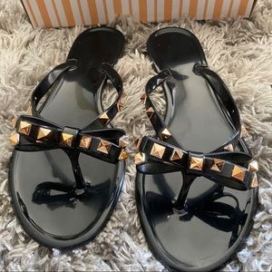 Black Jelly flat sandals with gold studs